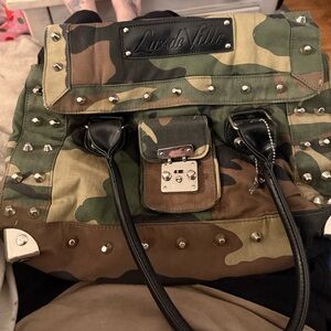 Cameo Lux De Ville studded hand bag-missing pin in clip but stays closed